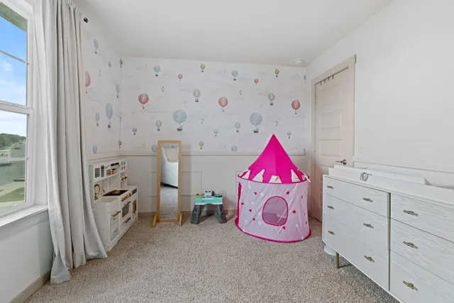 a bathroom with a sink a mirror and shower