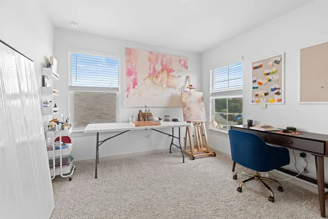 a bedroom with a large bed and closet