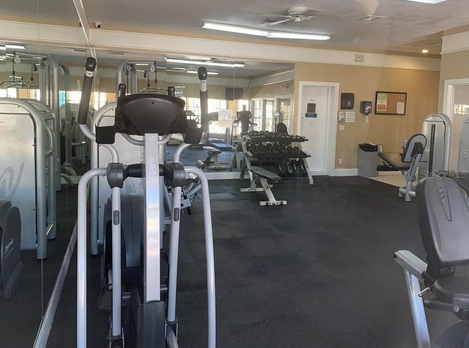 1071 South Hiawassee Road, Unit 1214 Orlando, FL 32835 - Photo 11 of 17 a view of a room with gym equipment
