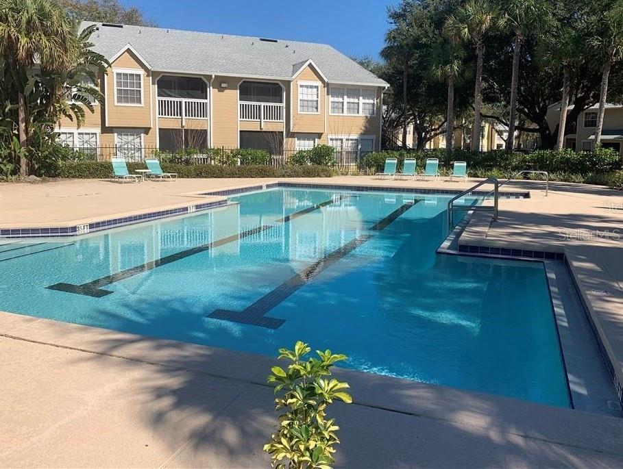1071 South Hiawassee Road, Unit 1214 Orlando, FL 32835 - Photo 14 of 17 a front view of a house with a yard