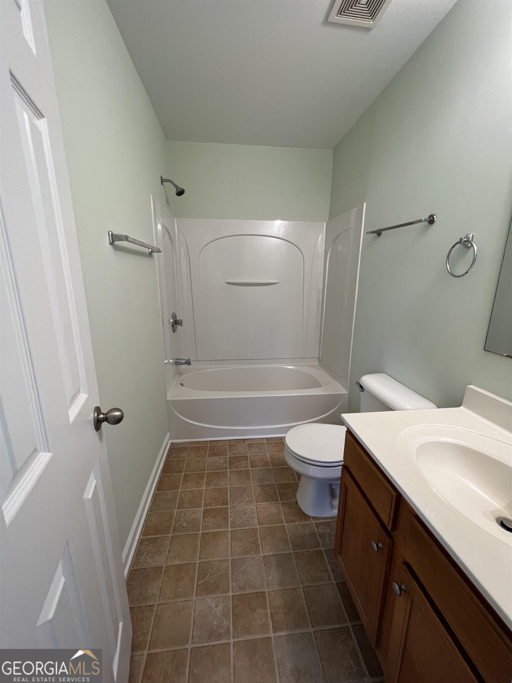 805 Crestwell Circle Atlanta, GA 30331 - Photo 12 of 12 a bathroom with a sink a toilet and shower