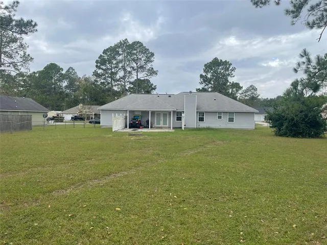 a house view with garden space