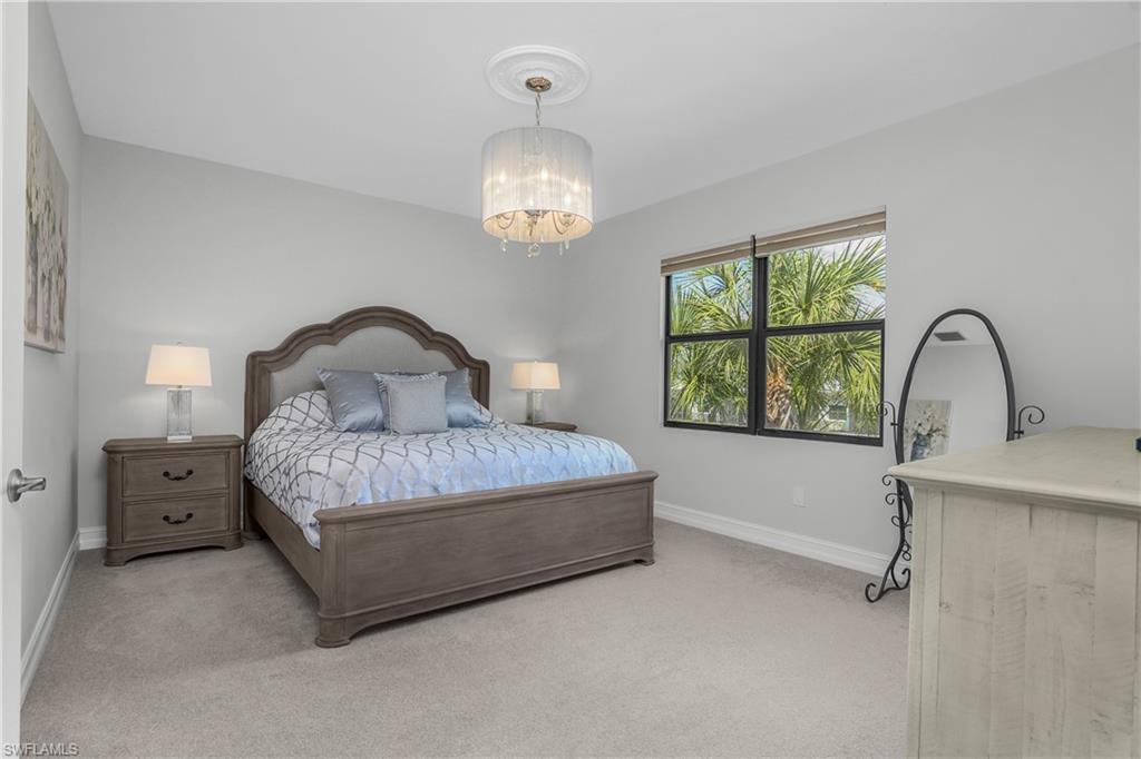 7588 Morgan Way Naples, FL 34119 - Photo 17 of 42 Spacious Primary Bedroom