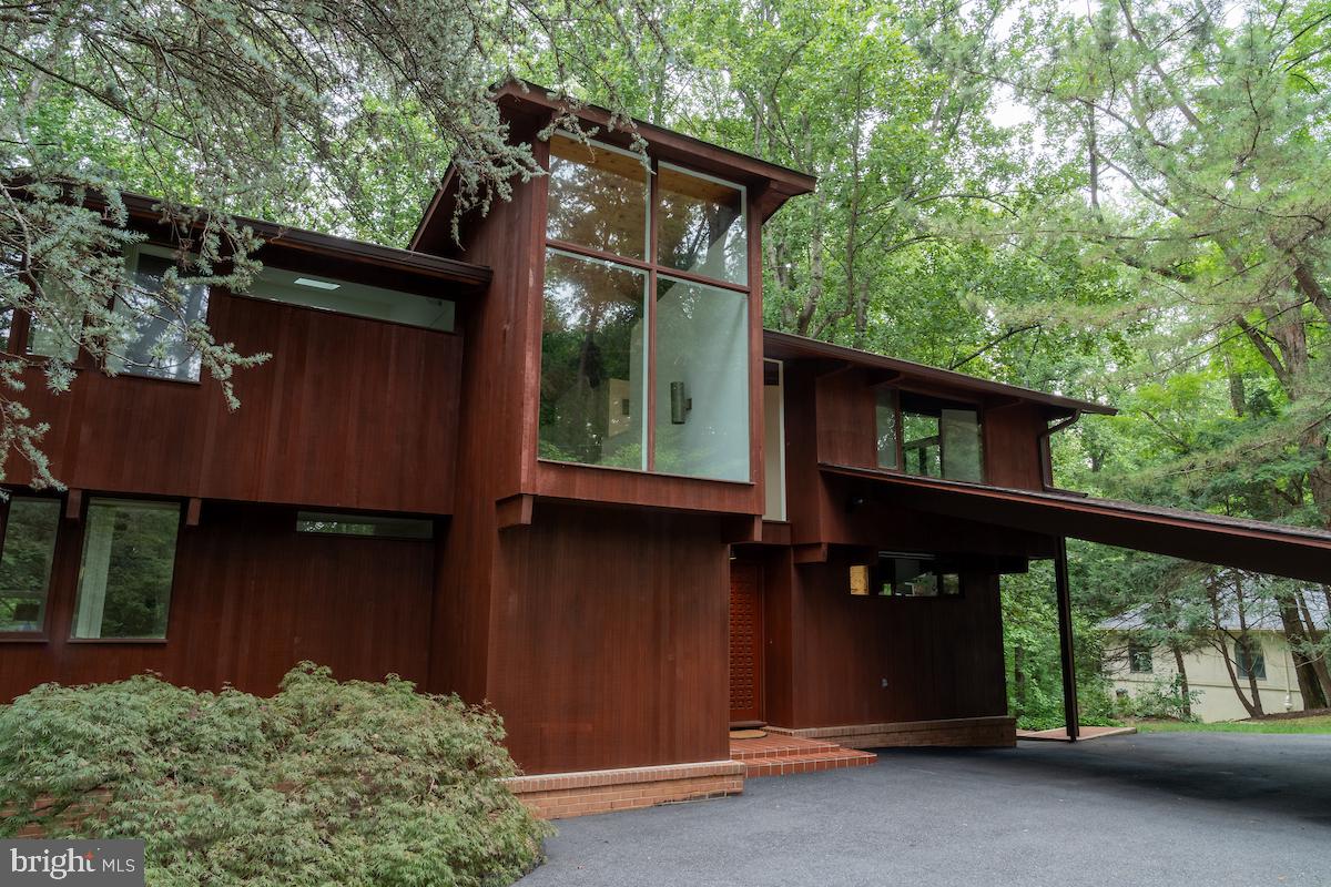 1330 Potomac School Road McLean, VA 22101 - Photo 1 of 36 Modern retreat nestled in lush greenery.
