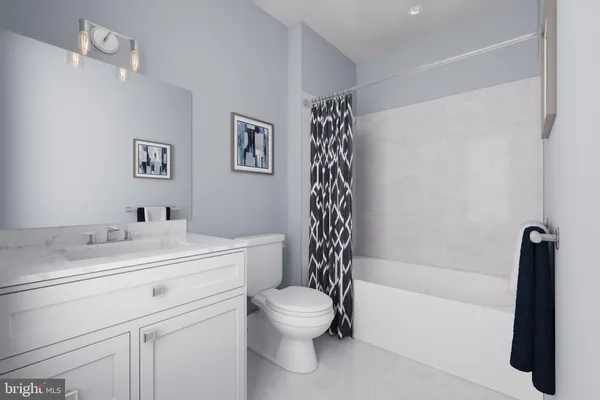 a bathroom with a sink a toilet and a bathtub