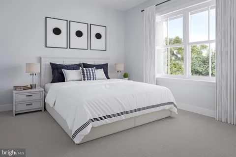 a bed room with a bed and a night stand