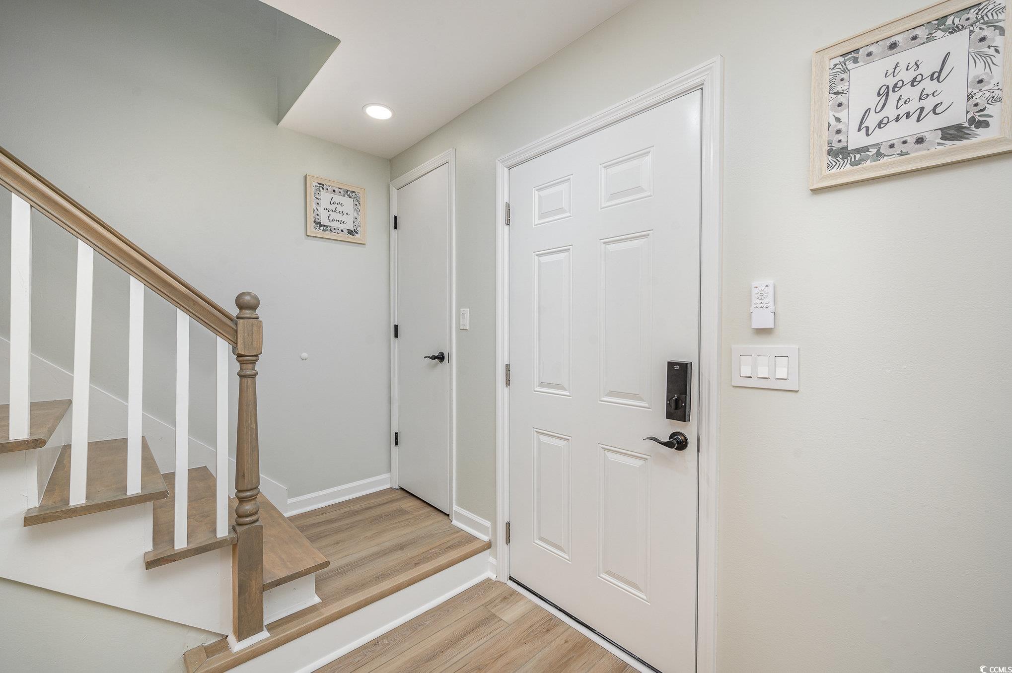 412 27th Avenue North Myrtle Beach, SC 29577 - Photo 12 of 35 Foyer with light wood-style floors, stairway, and recessed lighting