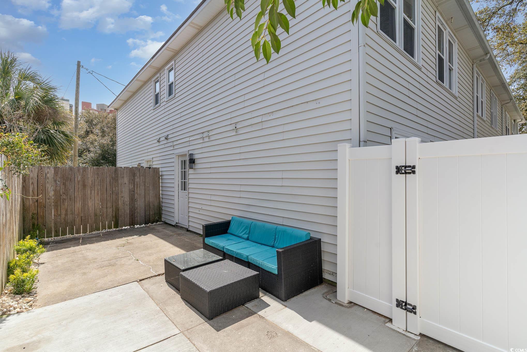 412 27th Avenue North Myrtle Beach, SC 29577 - Photo 20 of 35 View of patio / terrace with a gate and an outdoor hangout area