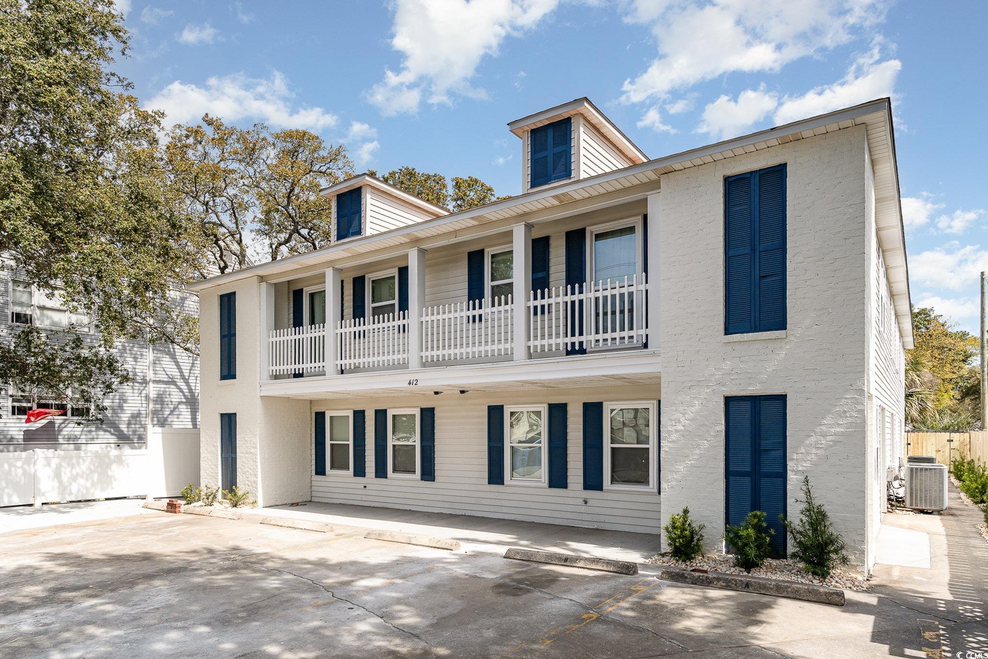 412 27th Avenue North Myrtle Beach, SC 29577 - Photo 27 of 35 Back of house with a balcony