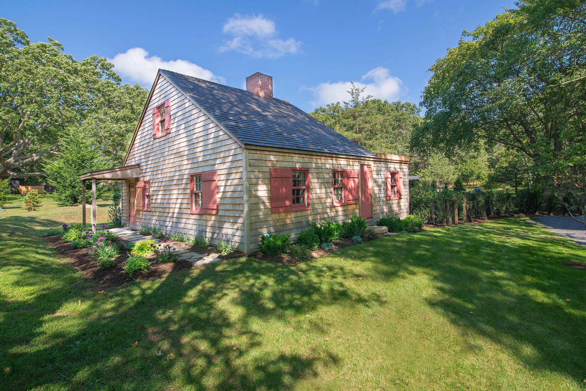 240 Three Mile Harbor Road East Hampton, NY 11937 - Photo 1 of 14 a view of a house with a garden
