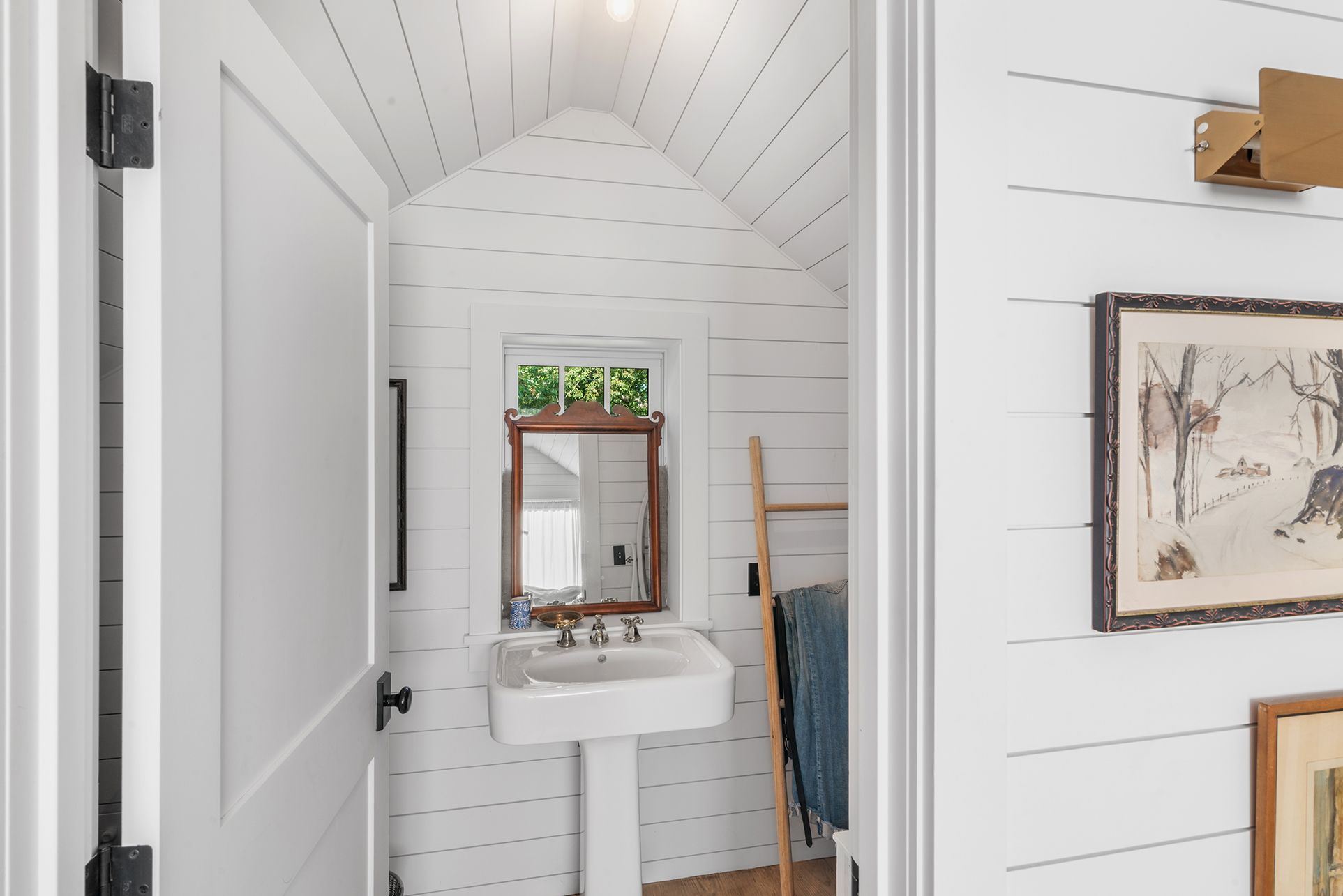 240 Three Mile Harbor Road East Hampton, NY 11937 - Photo 9 of 14 a bathroom with a sink and a mirror