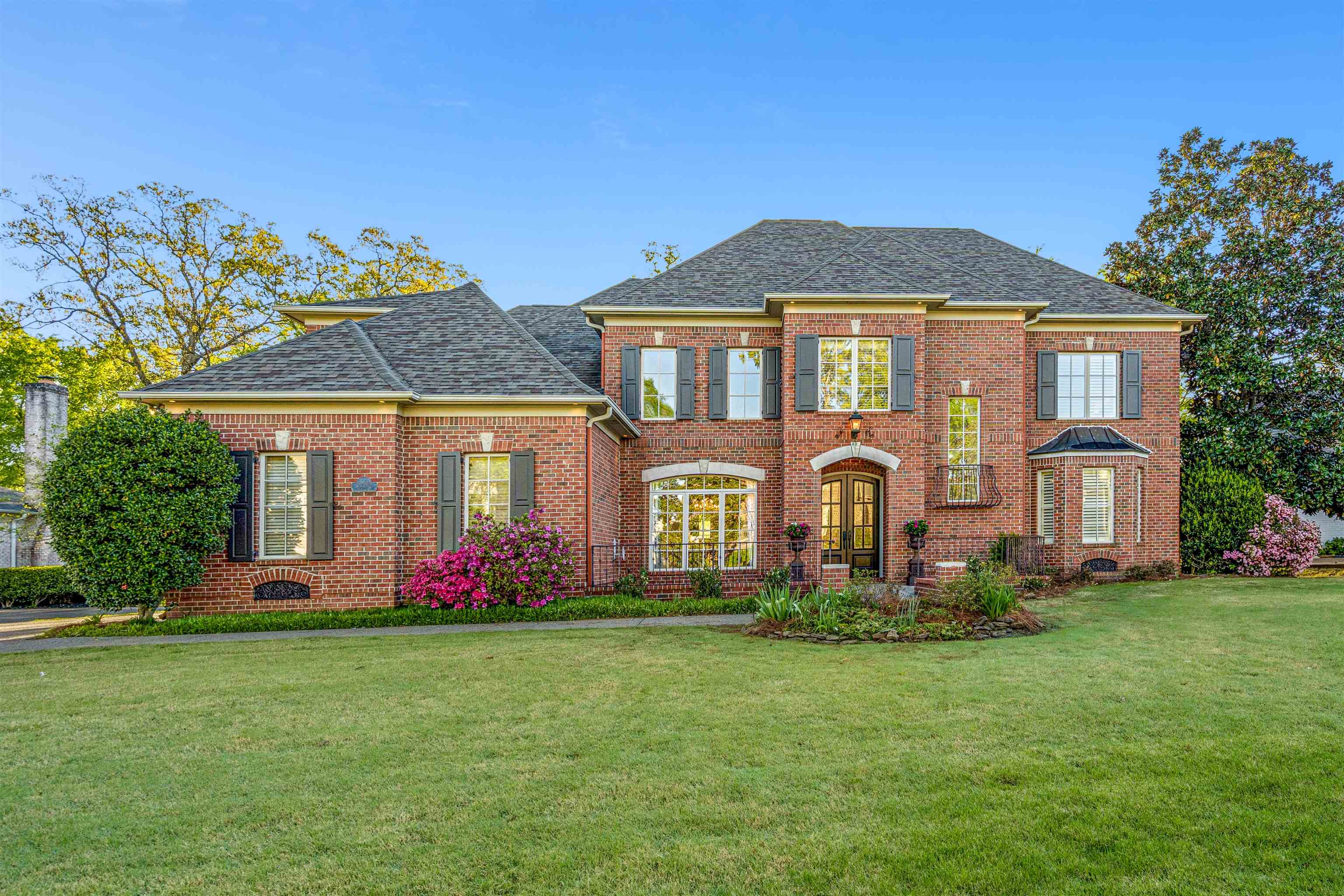 3084 Devonshire Way Germantown, TN 38139 - Photo 1 of 40 Colonial home with brick siding, a front yard, and roof with shingles