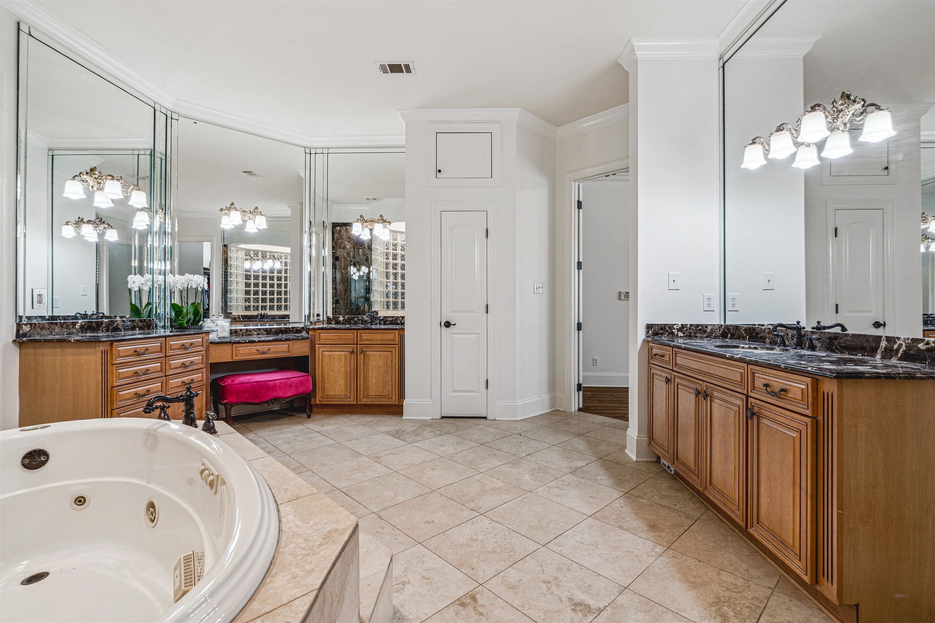 3084 Devonshire Way Germantown, TN 38139 - Photo 12 of 40 Bathroom featuring two vanities, ornamental molding, suspended lighting, and a whirlpool tub