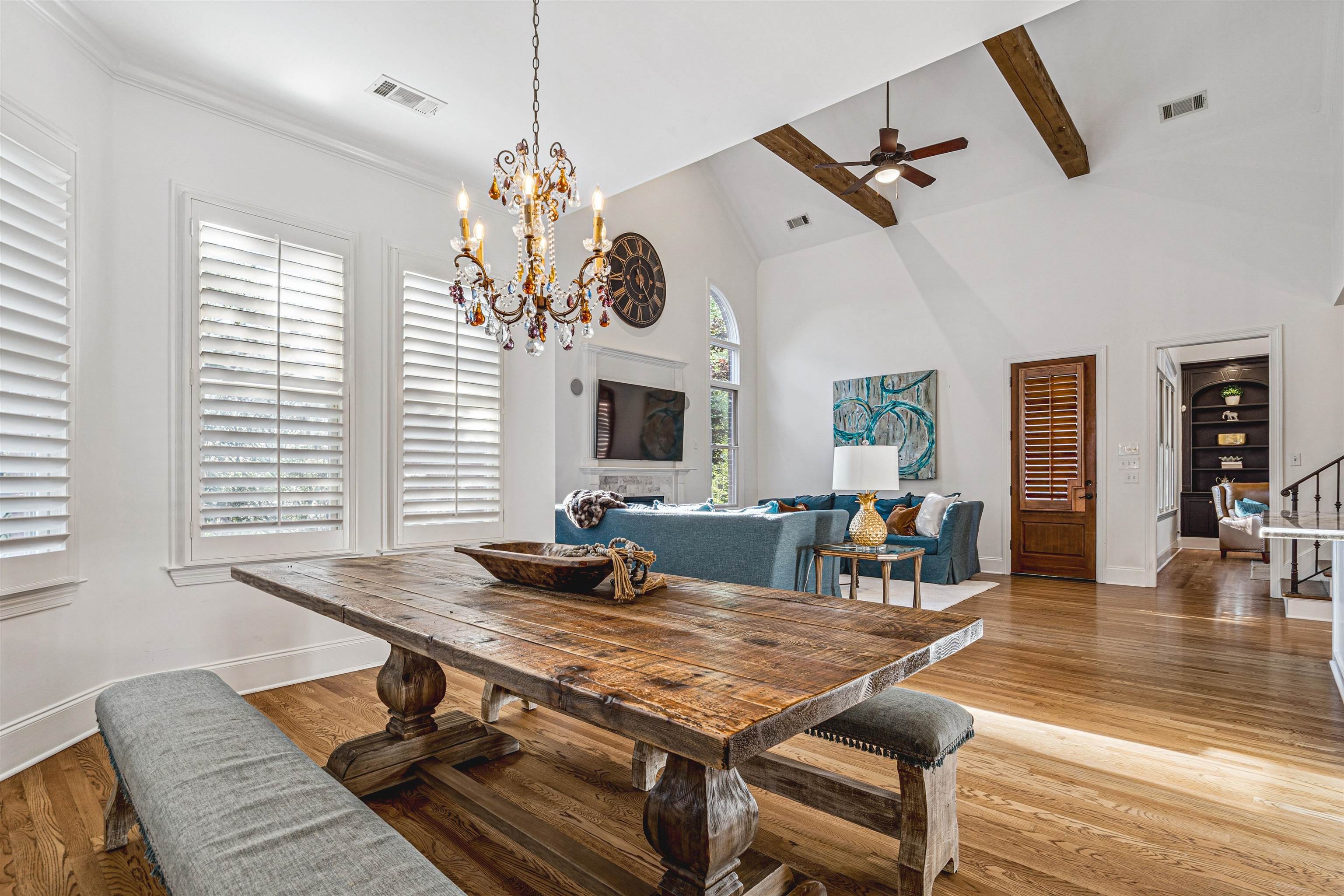 3084 Devonshire Way Germantown, TN 38139 - Photo 14 of 40 Dining room featuring wood finished floors, lofted ceiling, suspended lighting, and ceiling fan