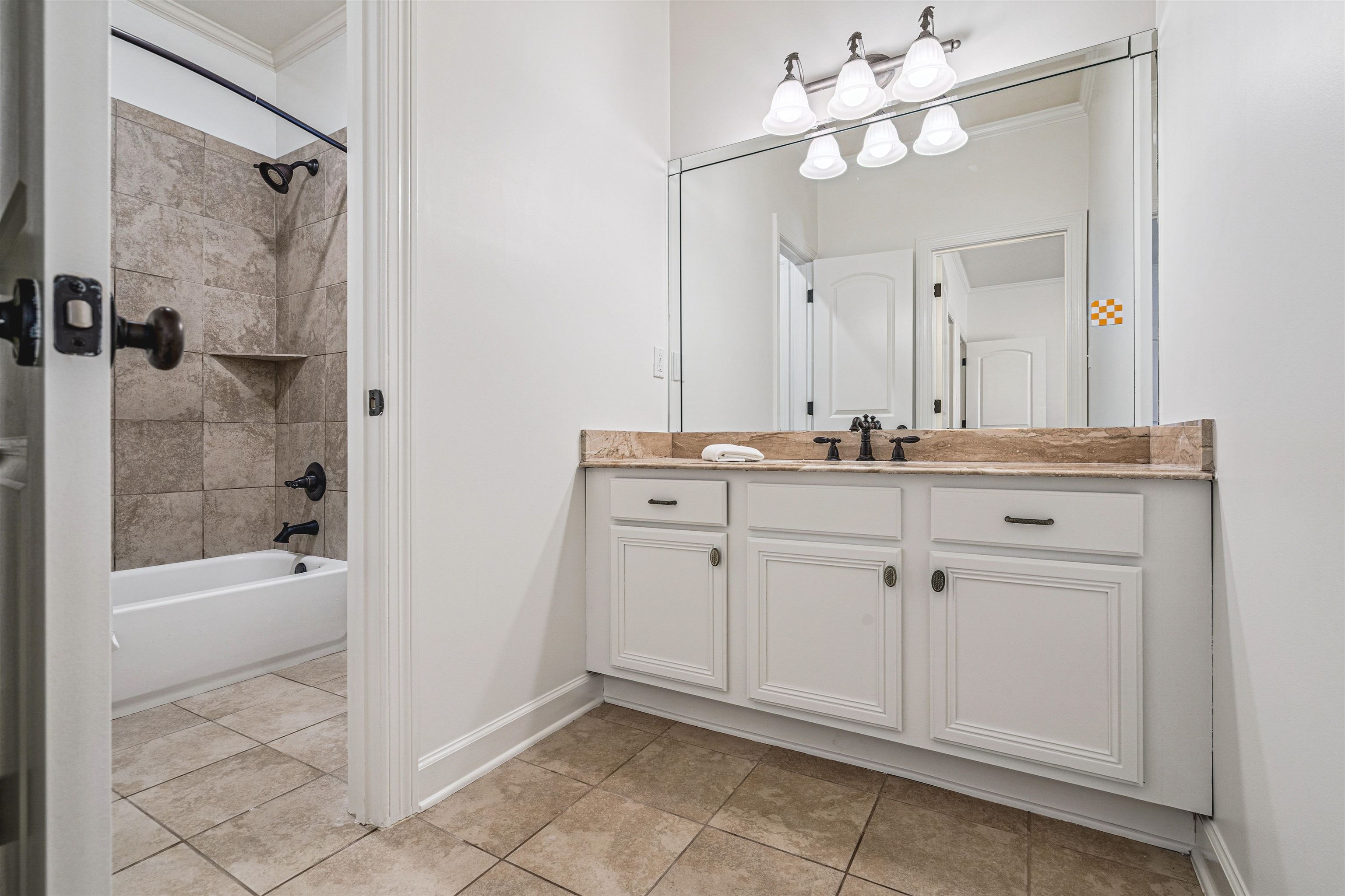 3084 Devonshire Way Germantown, TN 38139 - Photo 27 of 40 Full bath featuring vanity, crown molding, shower / tub combination, and light tile patterned floors