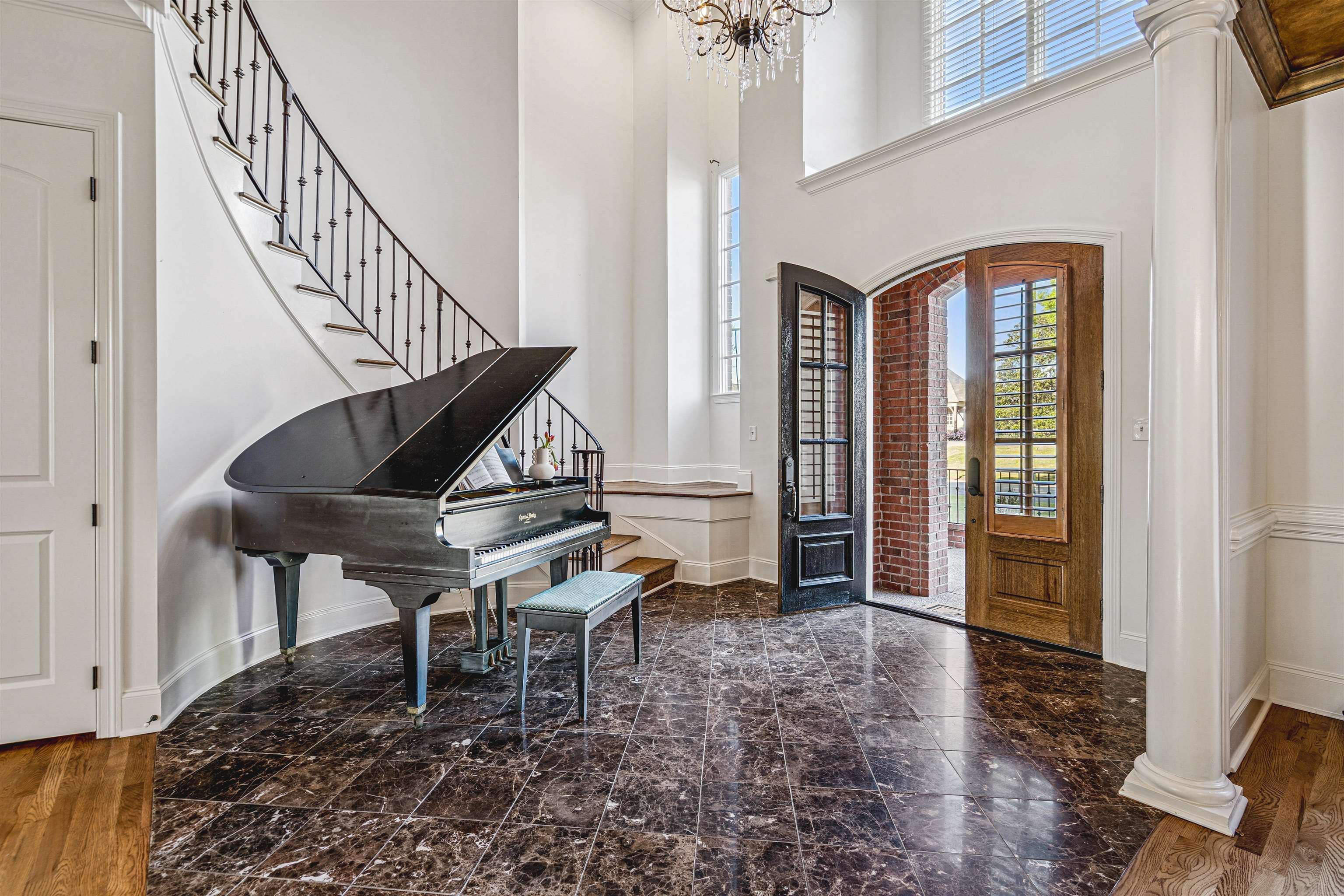 3084 Devonshire Way Germantown, TN 38139 - Photo 3 of 40 Foyer with hanging lights, arched walkways, a high ceiling, and french doors