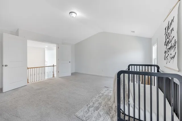 a view of backyard with large windows