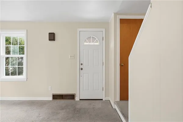 an empty room with windows