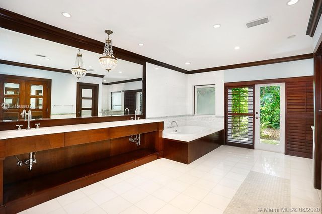 a large living room with large window