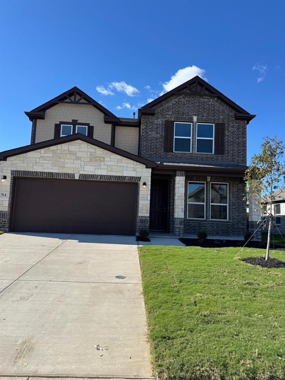764 Windsor Drive Princeton, TX 75407 - Photo 1 of 18 a front view of a house with a yard