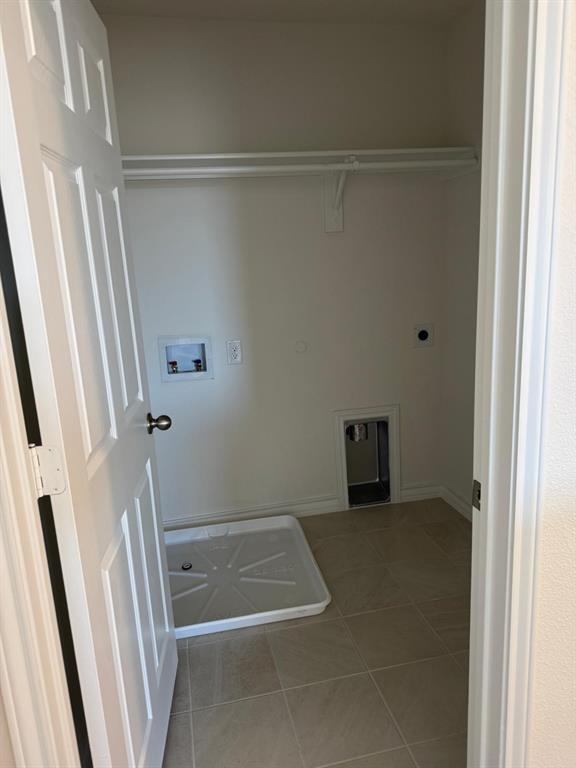 764 Windsor Drive Princeton, TX 75407 - Photo 11 of 18 a view of a room with door