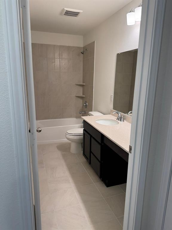 764 Windsor Drive Princeton, TX 75407 - Photo 15 of 18 a bathroom with a sink a toilet and shower