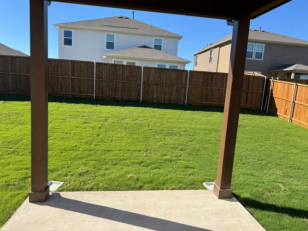 764 Windsor Drive Princeton, TX 75407 - Photo 18 of 18 a view of a backyard