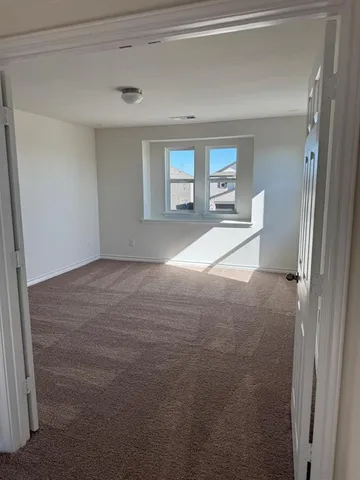 a view of livingroom with hardwood floor and window