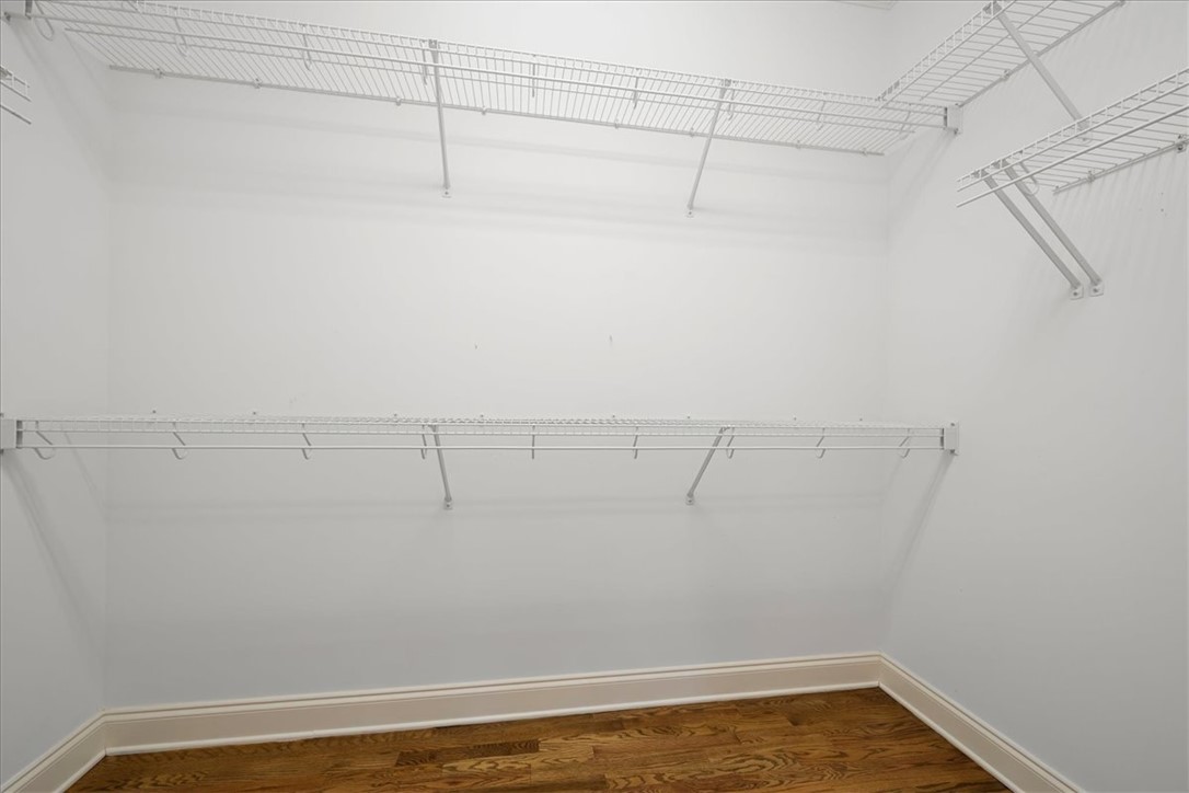128 Cayman Way Anderson, SC 29621 - Photo 25 of 49 Ample storage solutions define this versatile walk-in closet, ready for personalized organization.