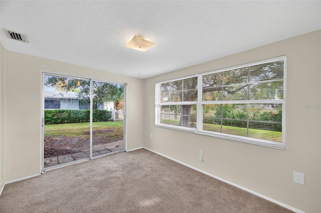 10102 Glen Moor Lane Port Richey, FL 34668 - Photo 32 of 49 a view of a room with a large window