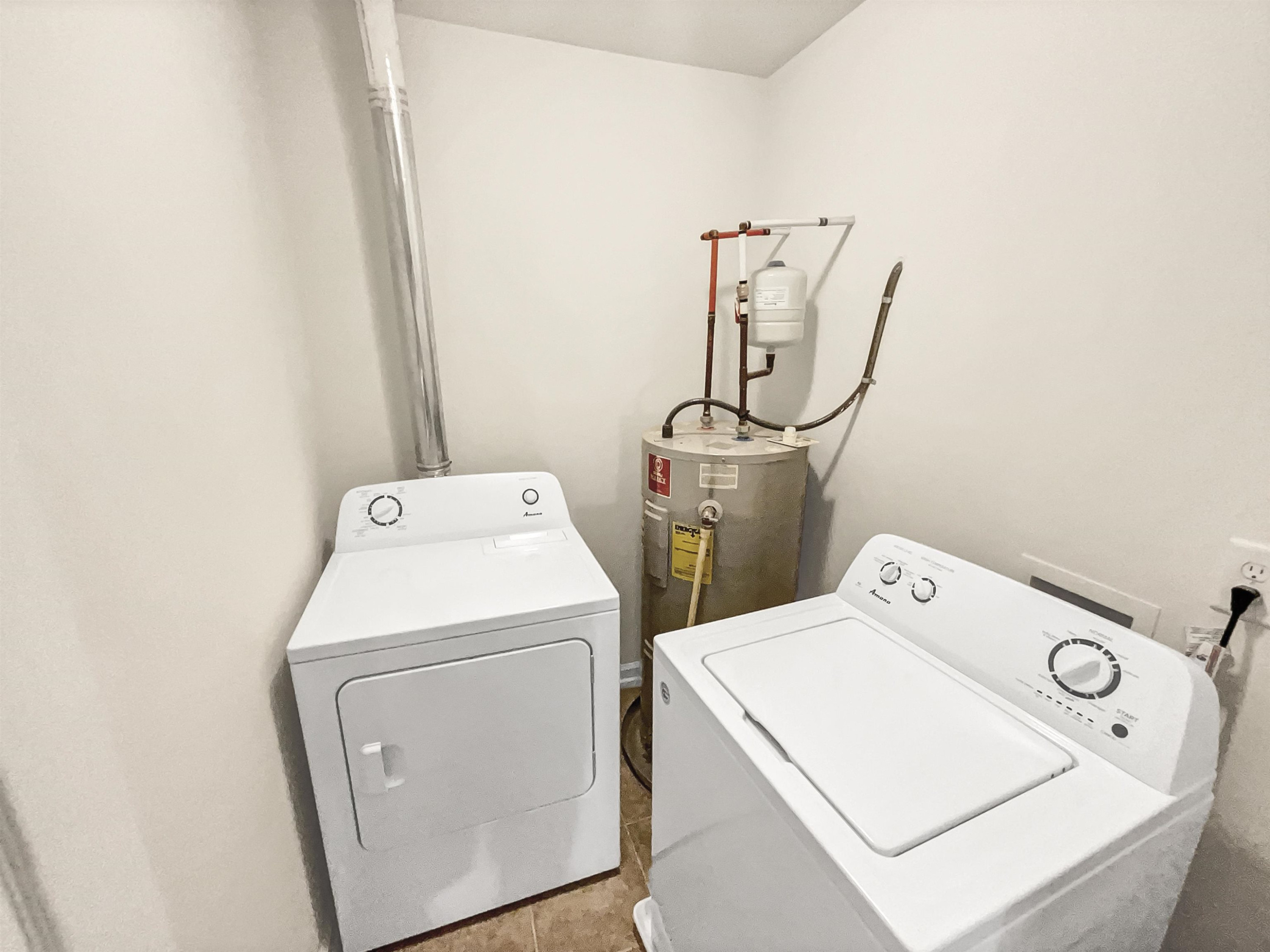 11720 Coppergate Drive, Unit 109 Raleigh, NC 27614 - Photo 13 of 16 a utility room with dryer and washer