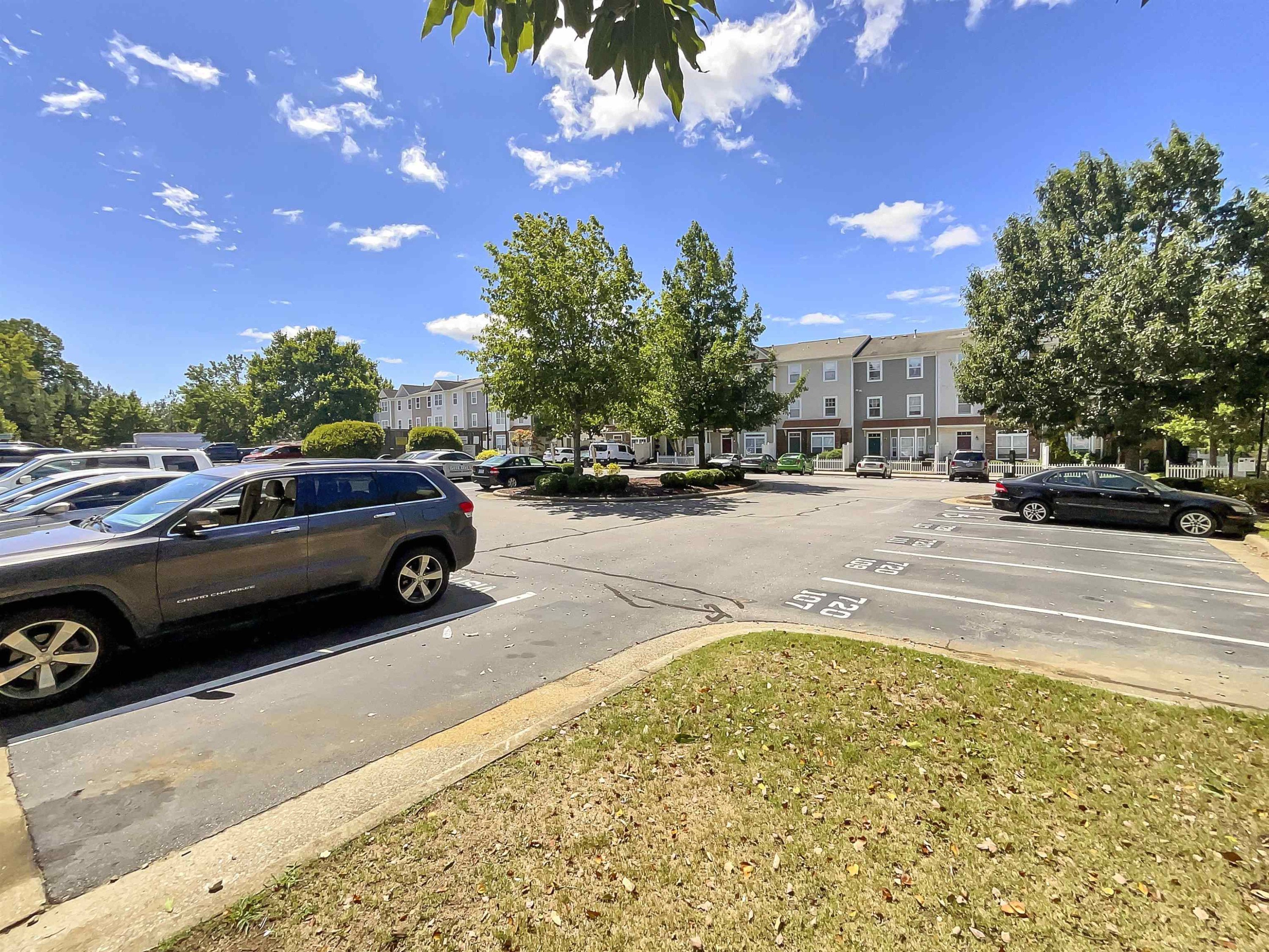 11720 Coppergate Drive, Unit 109 Raleigh, NC 27614 - Photo 15 of 16 a view of a street with a cars park