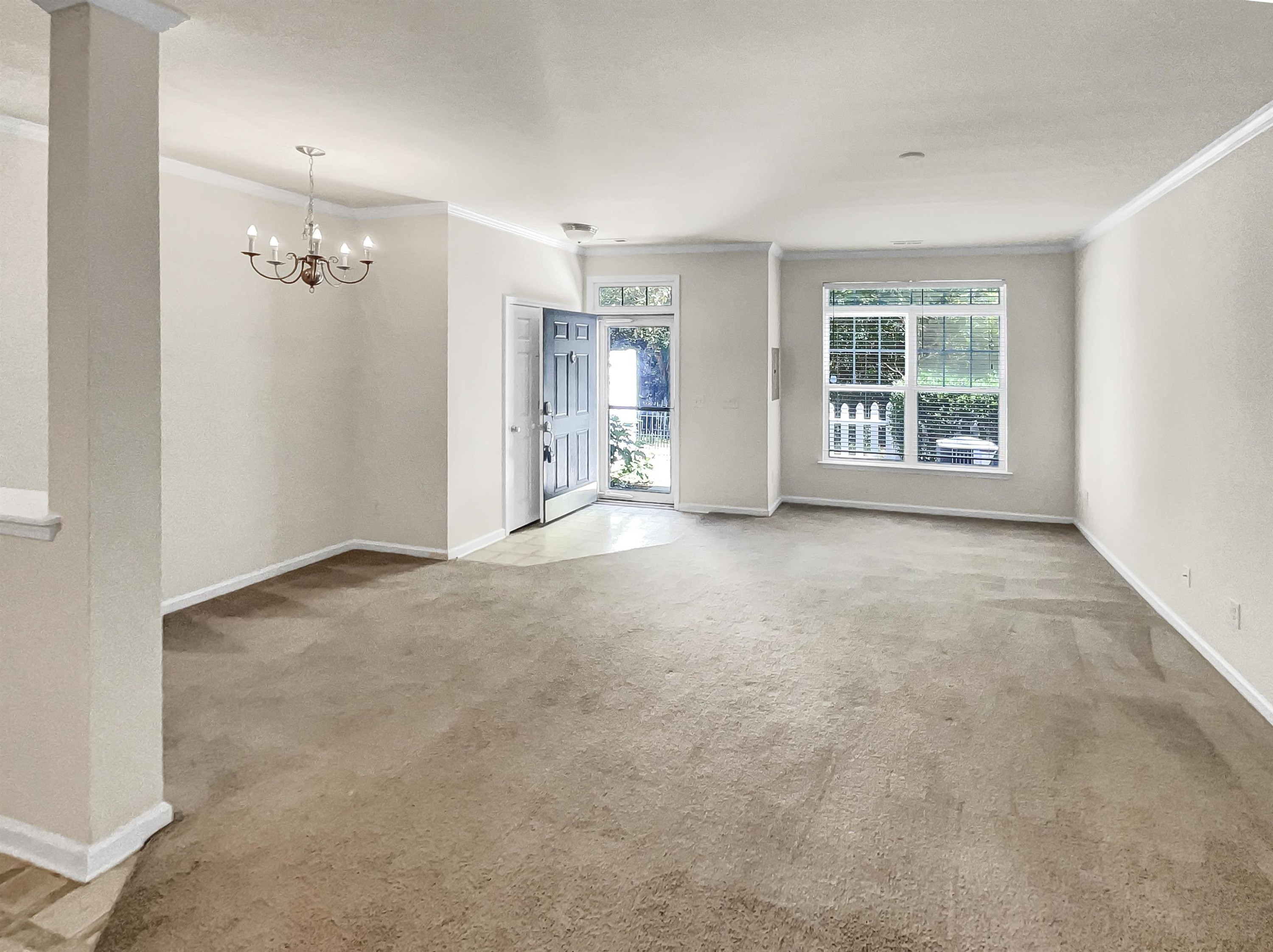 11720 Coppergate Drive, Unit 109 Raleigh, NC 27614 - Photo 2 of 16 an empty room with windows