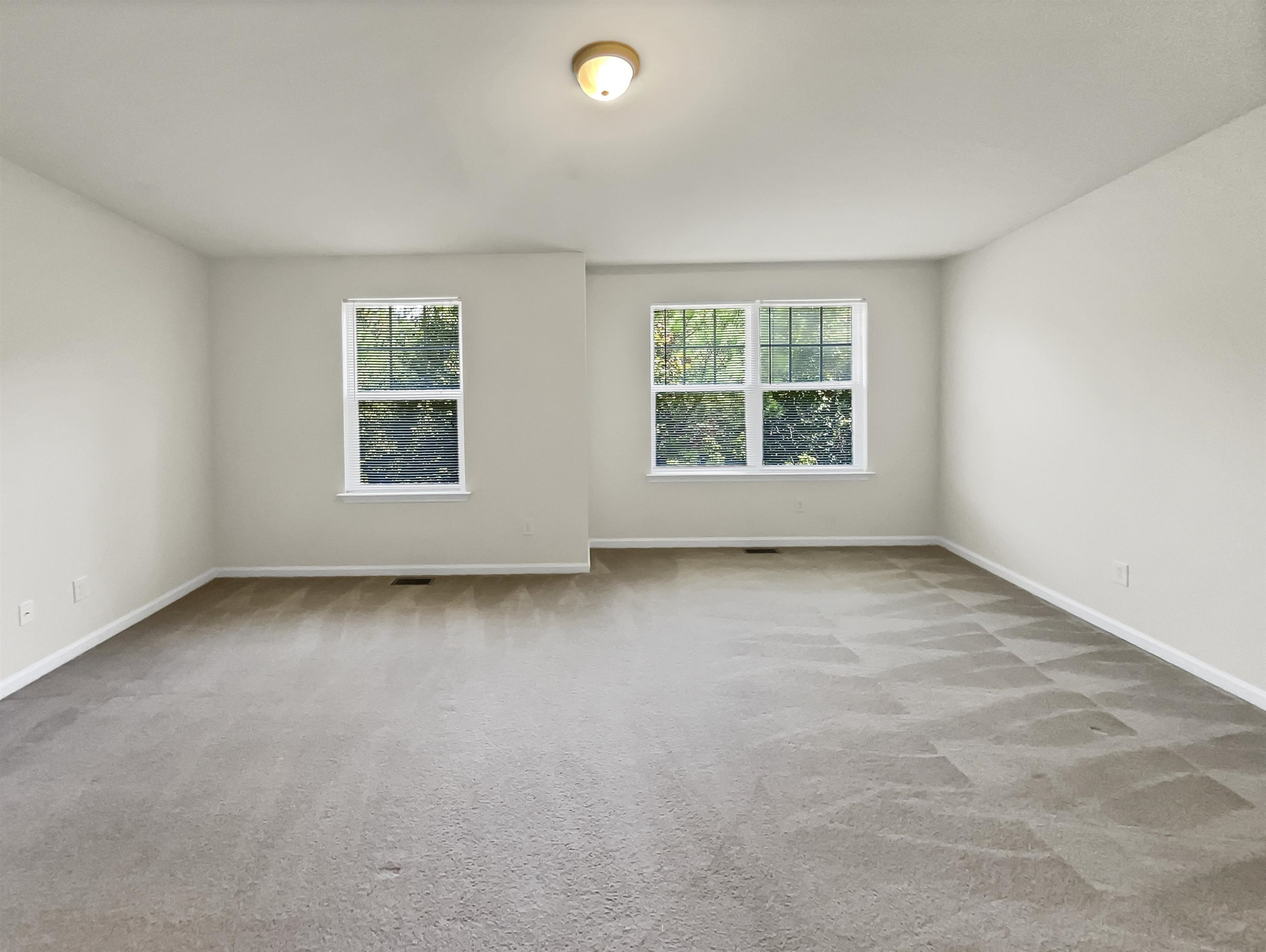 11720 Coppergate Drive, Unit 109 Raleigh, NC 27614 - Photo 3 of 16 an empty room with a window