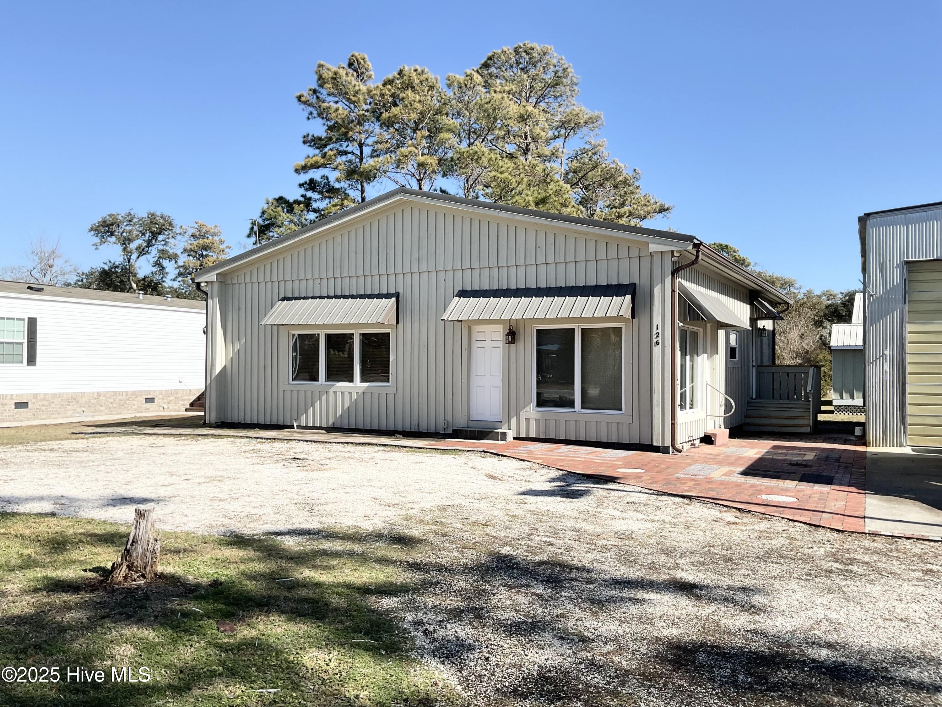 126 Northeast 75th Street, Unit BACK Oak Island, NC 28465 - Photo 1 of 10 IMG_0005