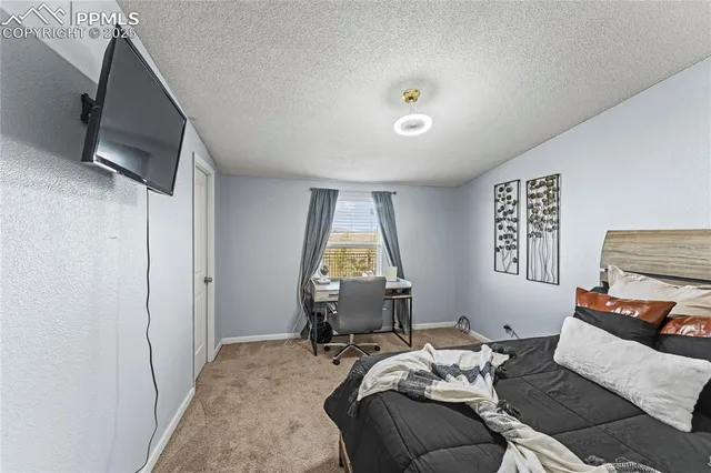 a room with furniture and a window