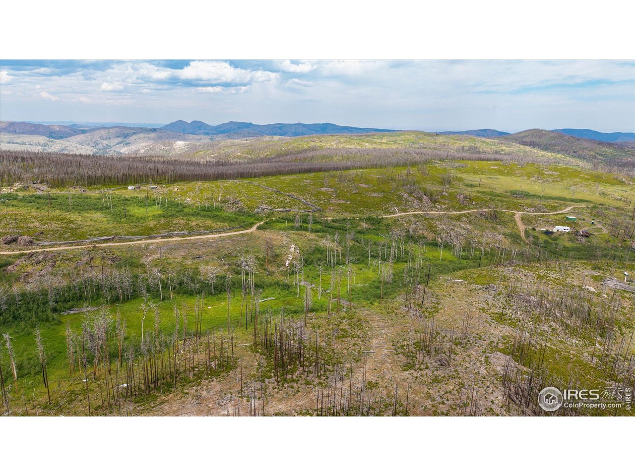 529 Quartz Road Bellvue, CO 80512 - Photo 24 of 31 a view of lake with mountain