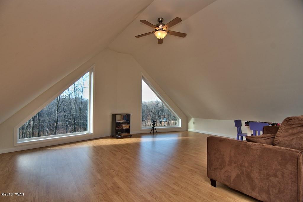 2312 Brookfield Road Lake Ariel, PA 18436 - Photo 13 of 26 a living room with furniture and a wooden floor