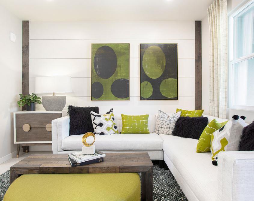 1786 Boxcar Circle Oakland, CA 94607 - Photo 4 of 5 a living room with a couch and a potted plant