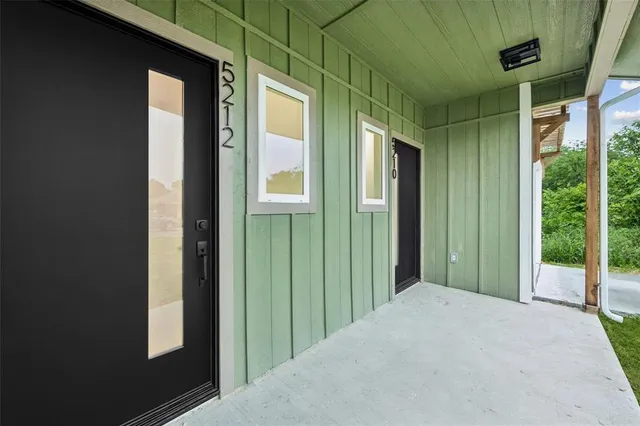 a view of an entryway with staircase