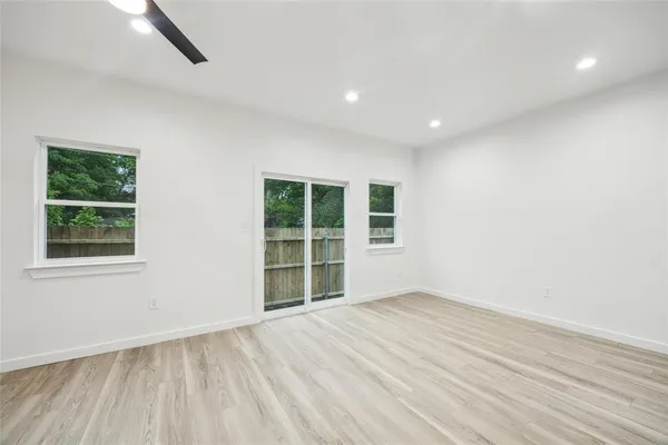 a large kitchen with stainless steel appliances lots of counter top space and cabinets