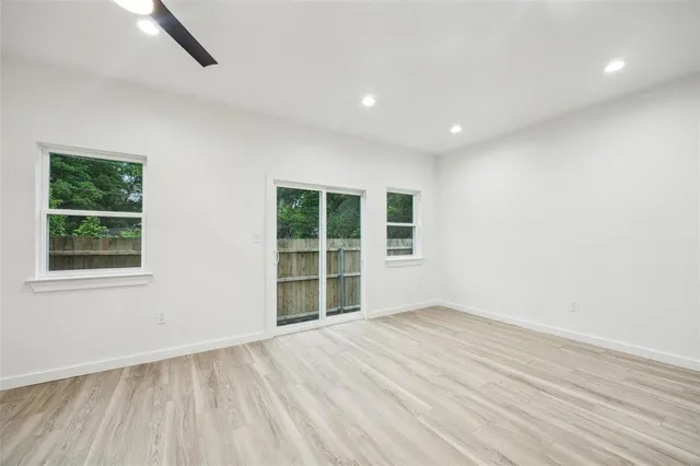a large kitchen with stainless steel appliances lots of counter top space and cabinets