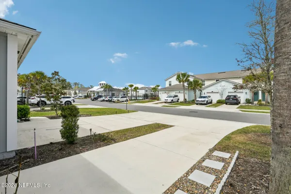 a view of a yard in front of the house
