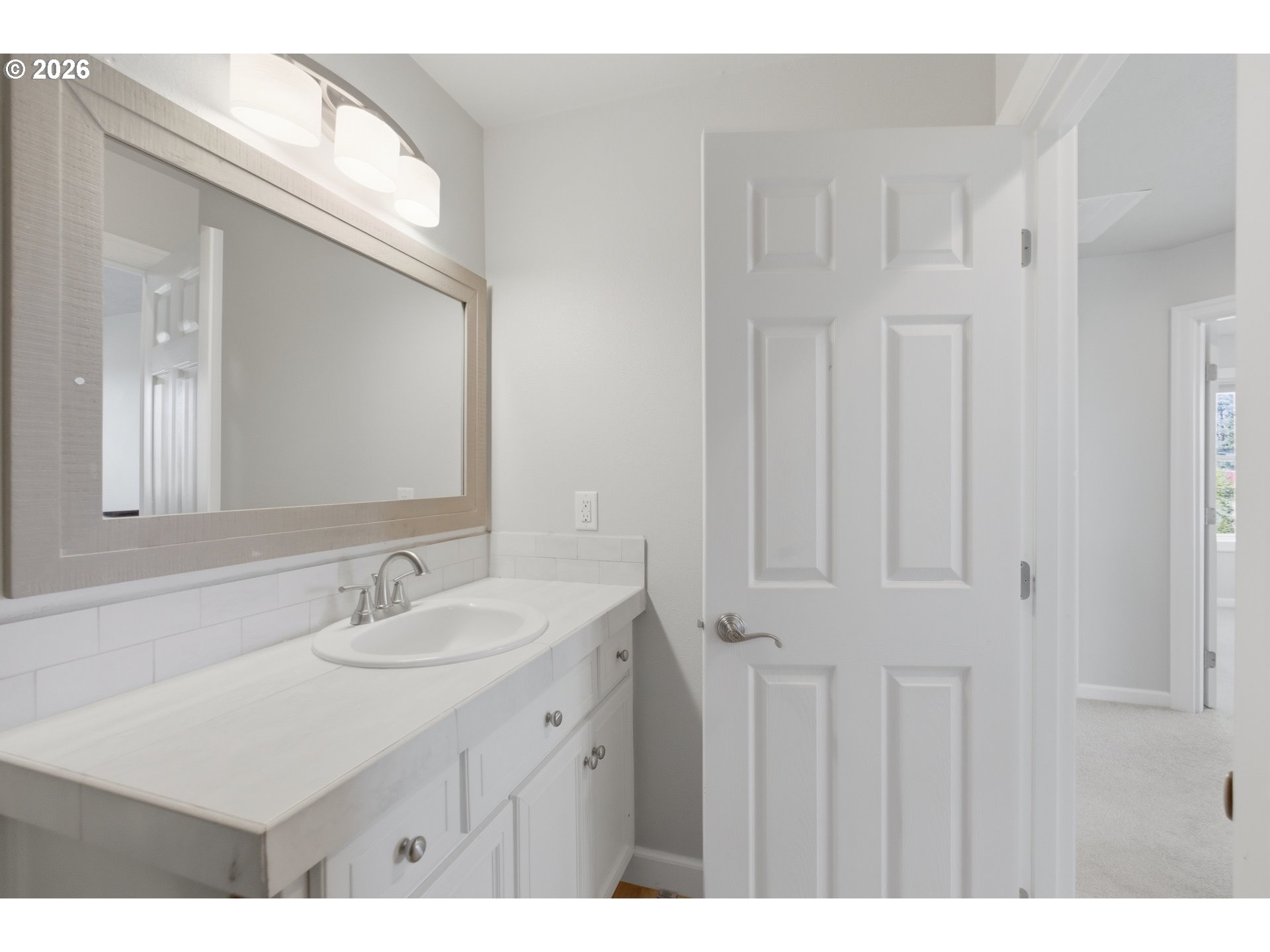 2925 Doaks Ferry Road Northwest Salem, OR 97304 - Photo 41 of 47 a bathroom with a sink vanity and a mirror
