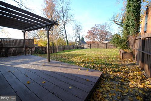 1115 Haverhill Road Baltimore, MD 21229 - Photo 22 of 30 Backyard and Back Deck with Pergola