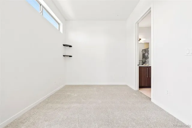 an empty room with an entryway