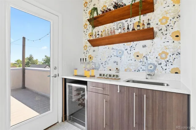 a view of kitchen with wooden floor