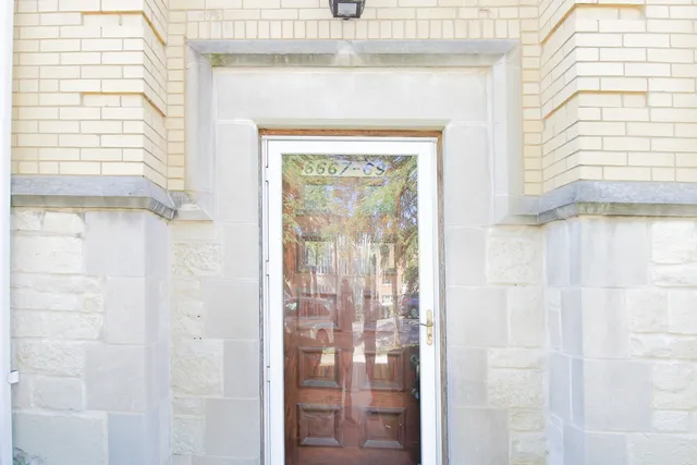 a view of a glass door with a glass door