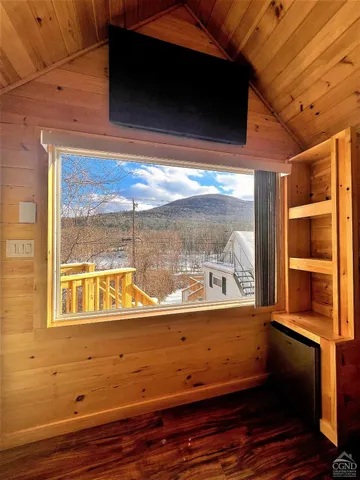 a wooden bench sitting in the middle of a lake