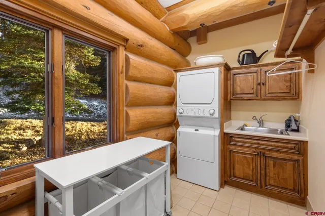 a utility room with washer and dryer